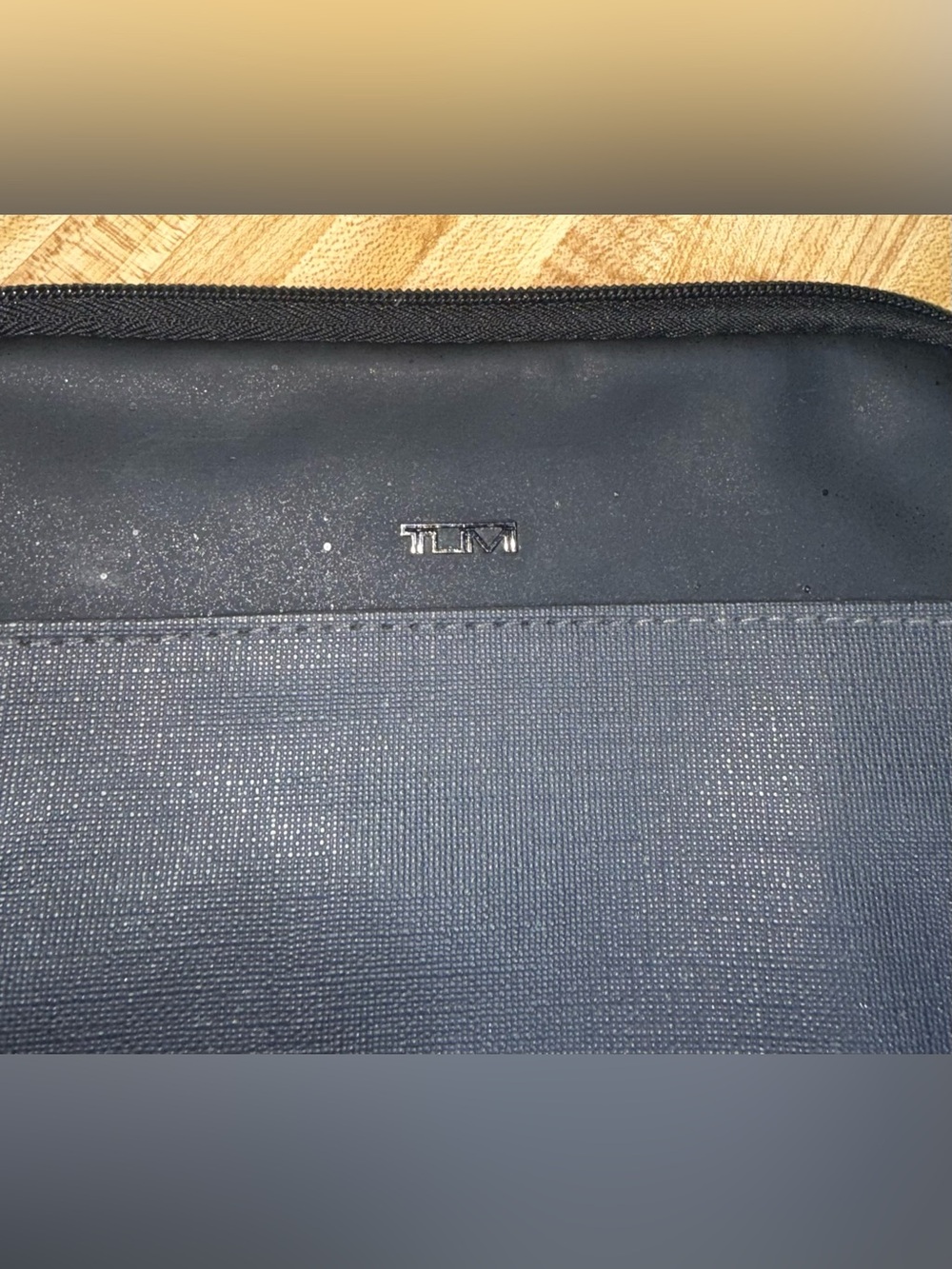 Tumi Navy and Black Travel Sleeve with Metal Logo